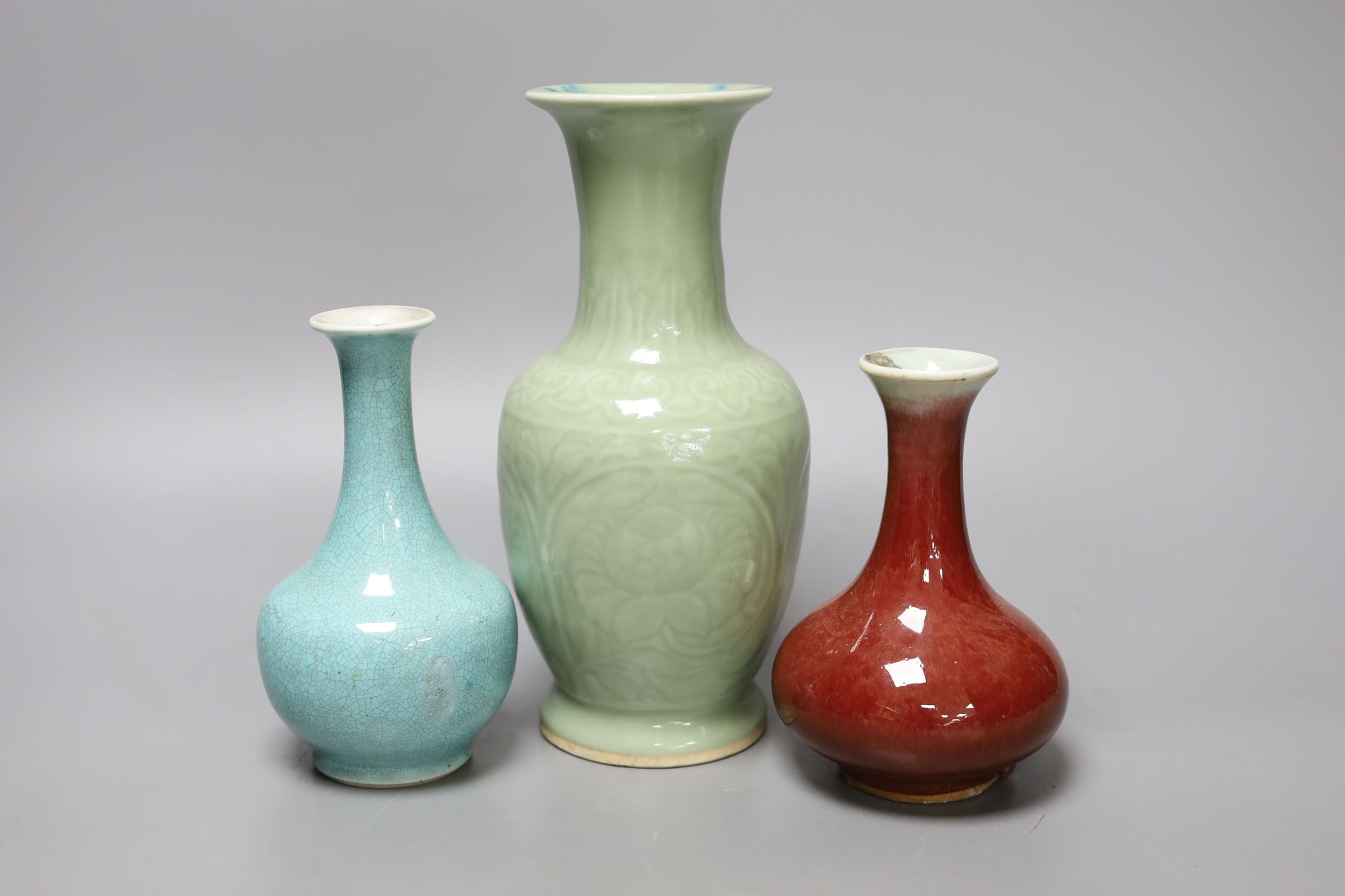 Three 19th Chinese monochrome glazed vases, with sang de boeuf, celadon and turquoise crackle glaze, tallest 21 cm
